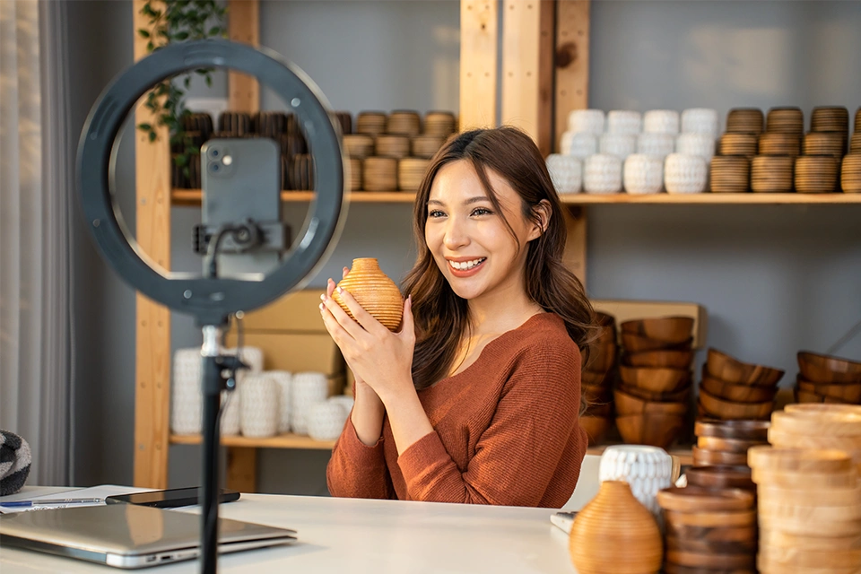 Influencer advertising a product, one of the ways influencers make money